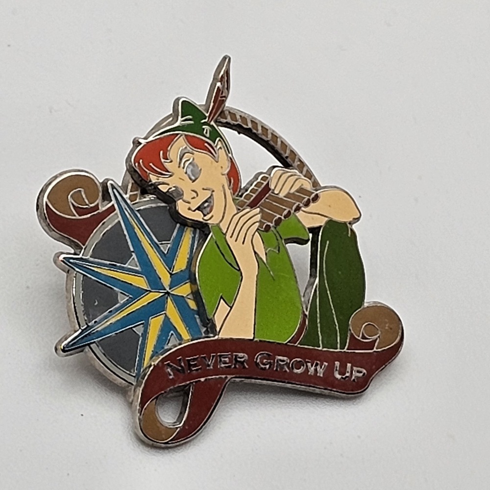 Disney Peter Pan with Pan Pipes & Compass Never Grow Up Trader Pin